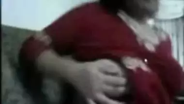 Colleague likes playing with her gigantic boobies in office