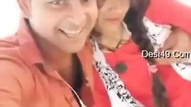Handsome young man paws Indian's perfect boobs through red dress
