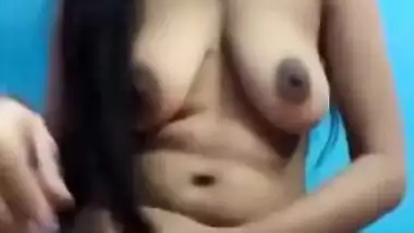 Cute Indian beauty showing off her ass and fingering cunt