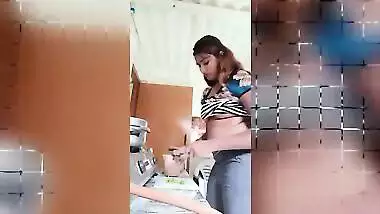 Chubby Desi gal while cooking can barely hide her perky XXX boobs