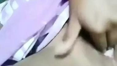 Girl masturbates and fingers her own pussy in the Desi amateur video